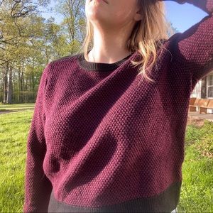 Wine and black sweater